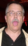 Gives a licking, keeps on ticking: Doc with his tongue hanging out