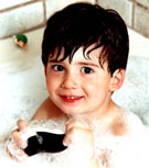 thumb.jpg: jeffrey in bubbles, tearing the head off a promotional penguin