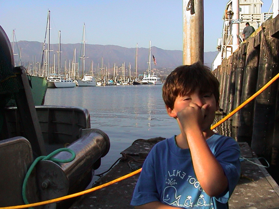 jeffholdingnose.jpg: jeff holding nose