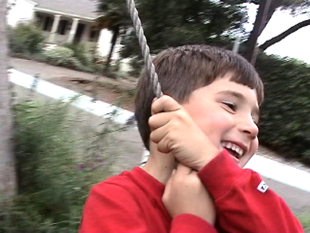 a.jpg: Jeff on swing with new haircut