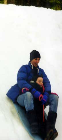NW snow continued yet again: Mom and the boogie board were happy to see one another.