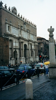 Piazza del Popolo: The arch at the entrance to the Piazza was originally one of the main entrance gates to Rome.